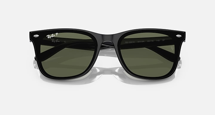 Ray-Ban RB4391D Black with Dark Green Polarized Solid Color lenses - Closed Front