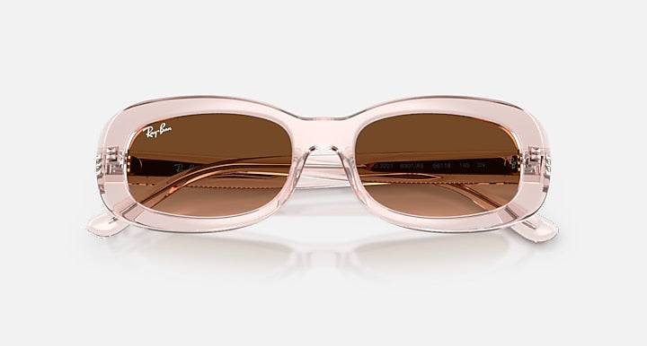 Ray-Ban RB2221 Transaprent Pink; Transparent Pink with Pink Gradient Brown & Arista Gold Blue Gradient lenses - Closed Front