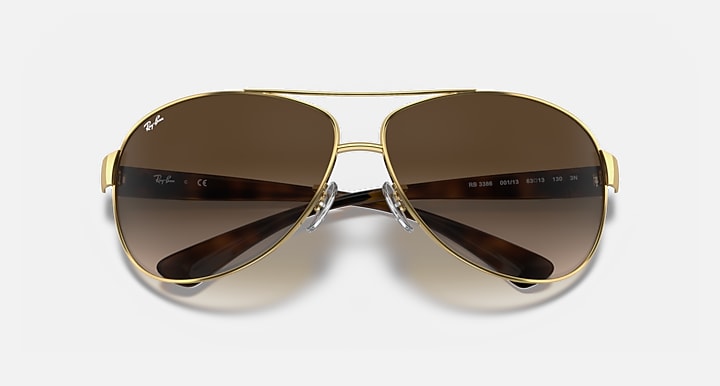 Ray-Ban RB3386 Arista Gold with Brown Gradient Gradient lenses - Closed Front