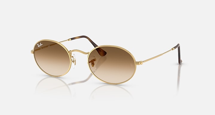 Ray-Ban OVAL METAL Arista Gold with Clear Gradient Brown Gradient lenses - Quarter