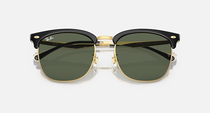 Ray-Ban RB4418D Black On Gold; Gold with Dark Green Solid Color lenses - Closed Front