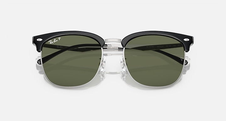 Ray-Ban RB4418D Black On Silver; Silver with Dark Green Polarized Solid Color lenses - Closed Front