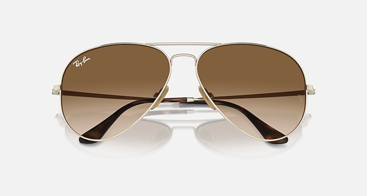 Ray-Ban AVIATOR TITANIUM Arista Gold with Clear & Brown Gradient lenses - Closed Front