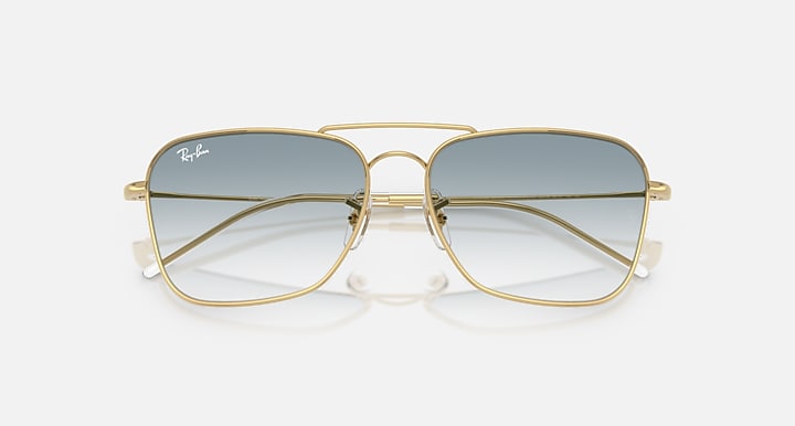 Ray-Ban CARAVAN REVERSE Arista Gold with Clear Gradient Blue Gradient lenses - Closed Front