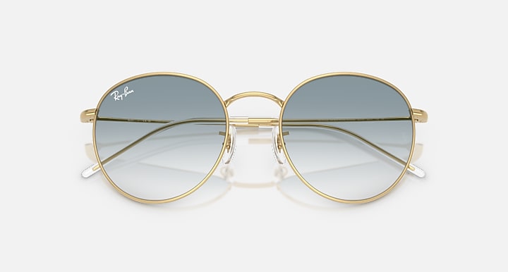 Ray-Ban ROUND REVERSE Arista Gold with Clear Gradient Blue Gradient lenses - Closed Front