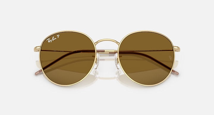 Ray-Ban ROUND REVERSE Arista Gold with Polarized Brown Solid Color lenses - Closed Front
