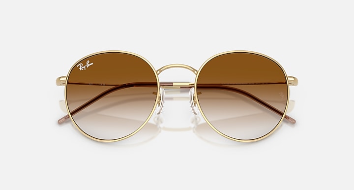 Ray-Ban ROUND REVERSE Arista Gold with Clear Gradient Brown Gradient lenses - Closed Front