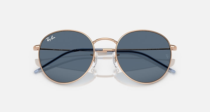 Ray-Ban ROUND REVERSE Rosegold; Rose Gold with Dark Blue Solid Color lenses - Closed Front