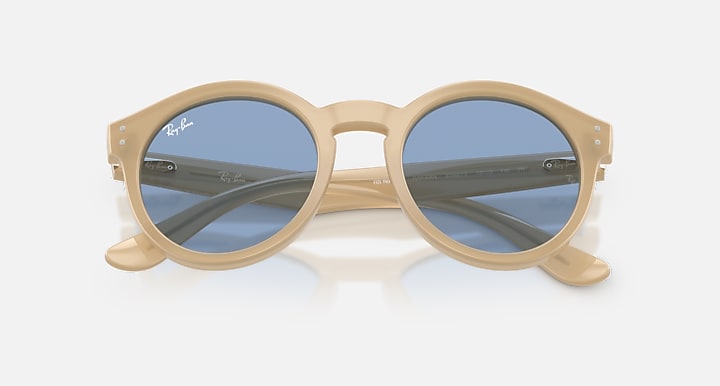 Ray-Ban 2180 REVERSE Opal Beige with Light Blue Solid Color lenses - Closed Front
